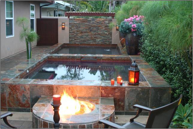 Backyard With Hot Tub And Fire Pit